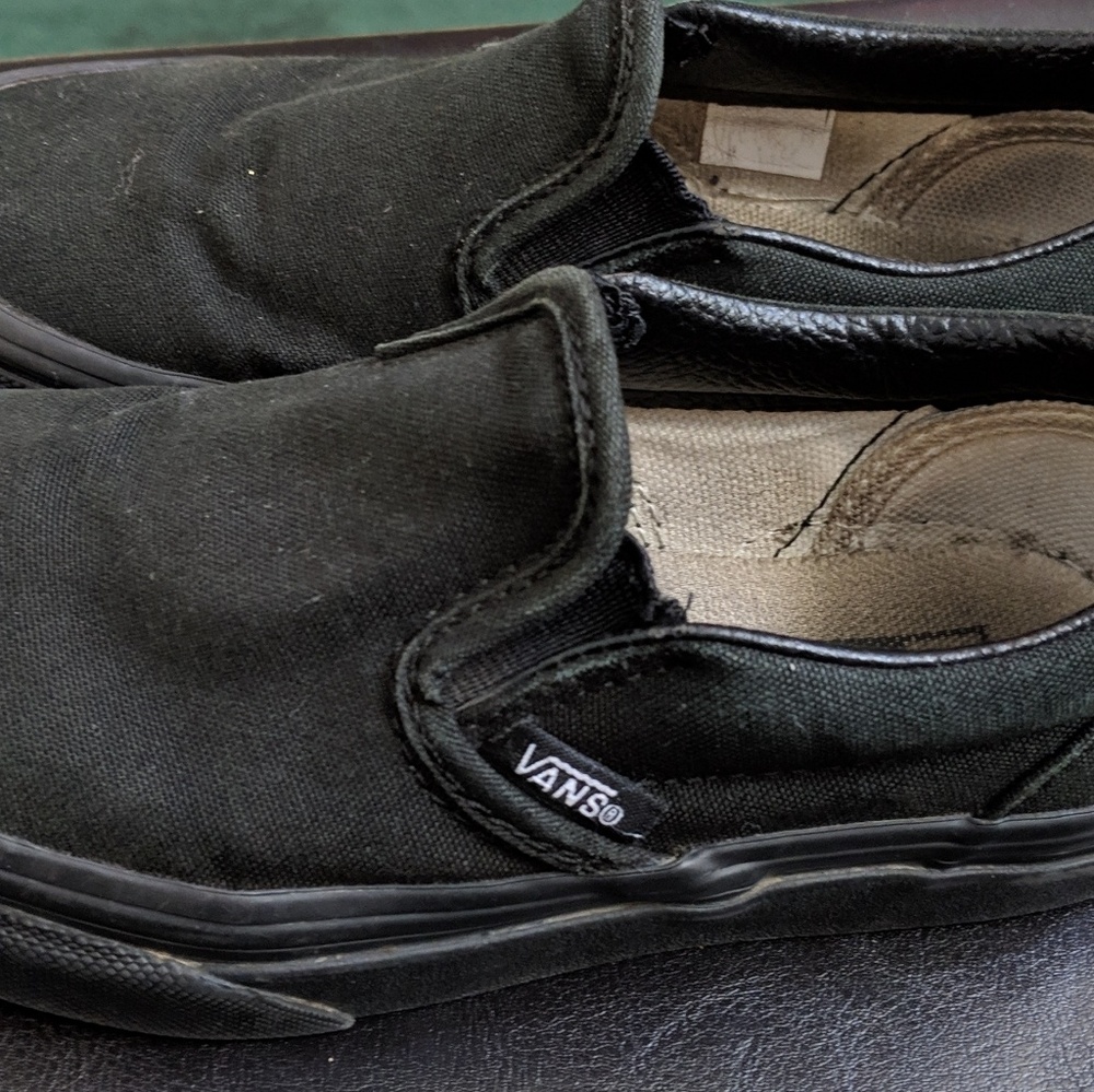 Vans black slip on shoes